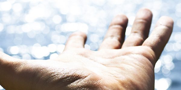 Man feeling freedom on open sea